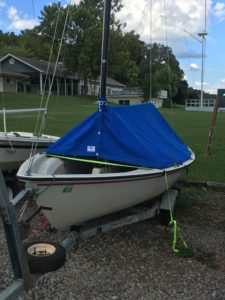 Dinghy sailboat with boom cover